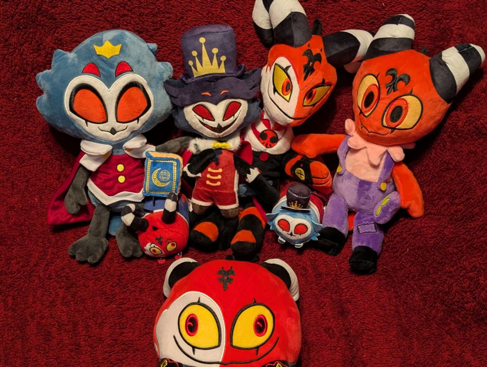 Premium Blitzø, Smiling Stolas, Stolitz Nuggets, Musical Stolitz, and Blitzø Ball, arranged for a family photo.