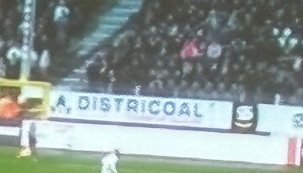 An advert for Districoal at the side of the pitch at Charleroi. 