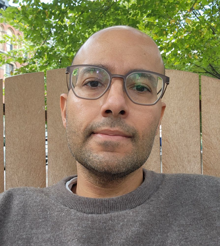 Selfie on a chair in front of trees