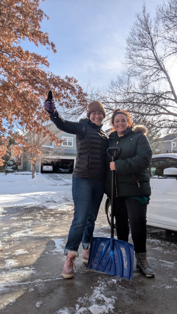 Becky and Rachel pose with a freshly shoveled driveway. 