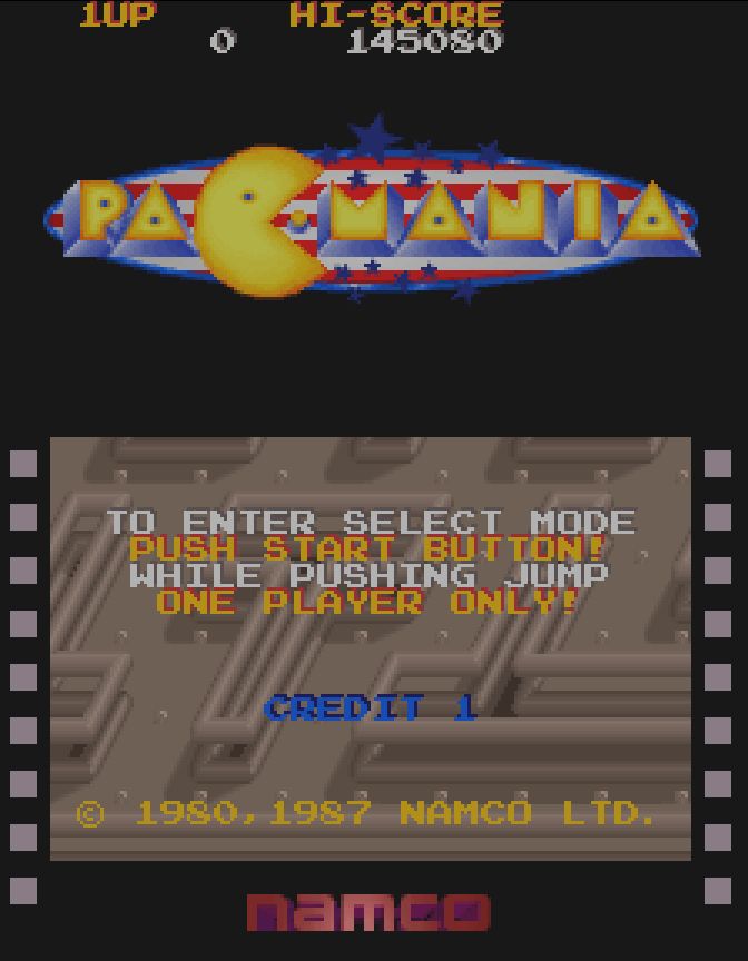 A screenshot of the Japanese titlescreen of Pac-Mania (1987, Namco)
There's text reading:
To enter select mode
Push start button!
While pushing Jump
One player only!
