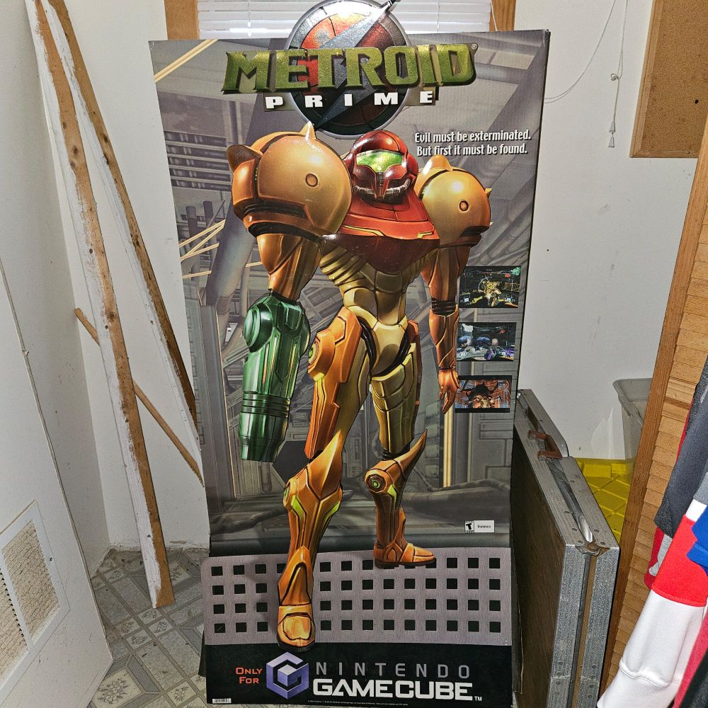 Metroid Prime cardboard promo standee of Samus Aran in the Varia suit