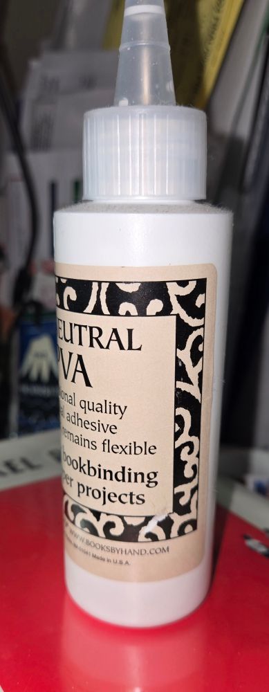 PH neutral PVA bookbinding glue bottle.