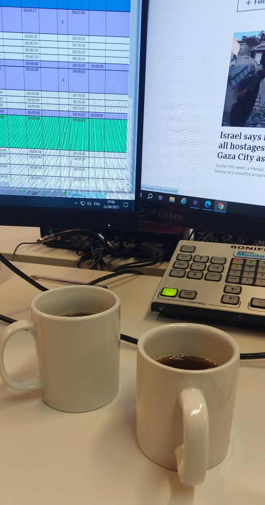 Two cups of tea on a desk