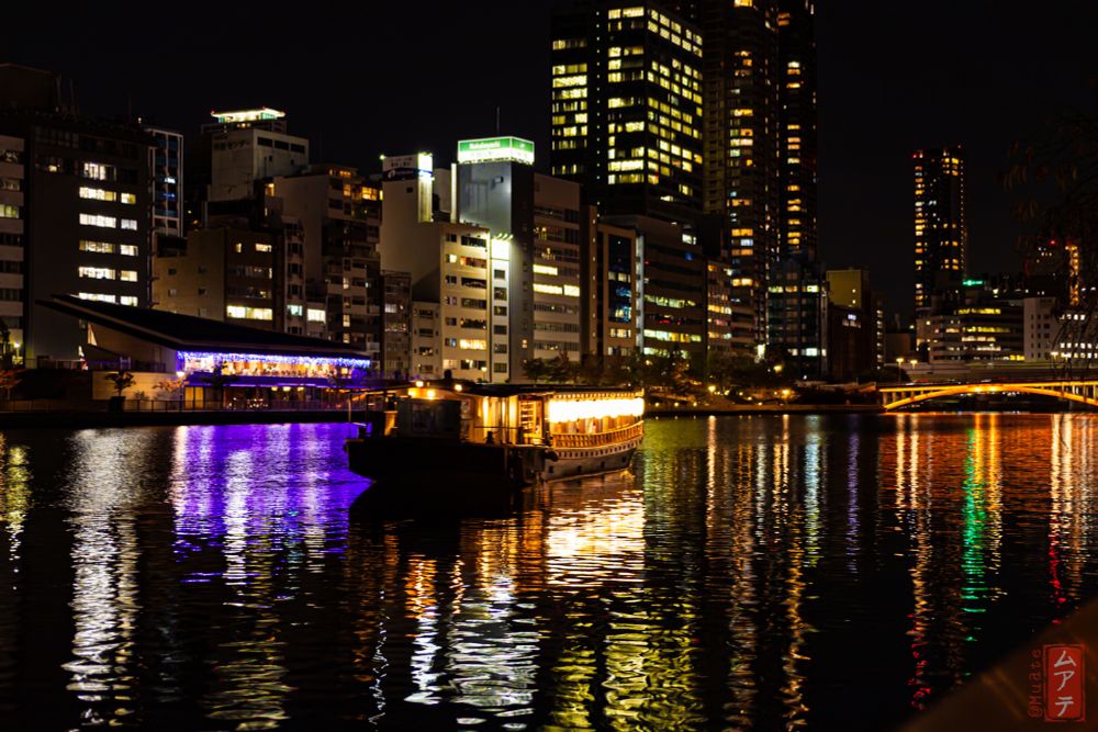 View on a Boat in the Okawa-River in Osaka at Night