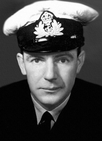 Photo of Cecil Williams (an European) wearing some naval hat.