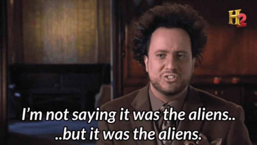 a man in a suit and tie says " i 'm not saying it was the aliens but it was the aliens "