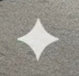 A watermark on the image with all of these fairly obvious indicators of genAI slop, a sort of diamond with concave sides