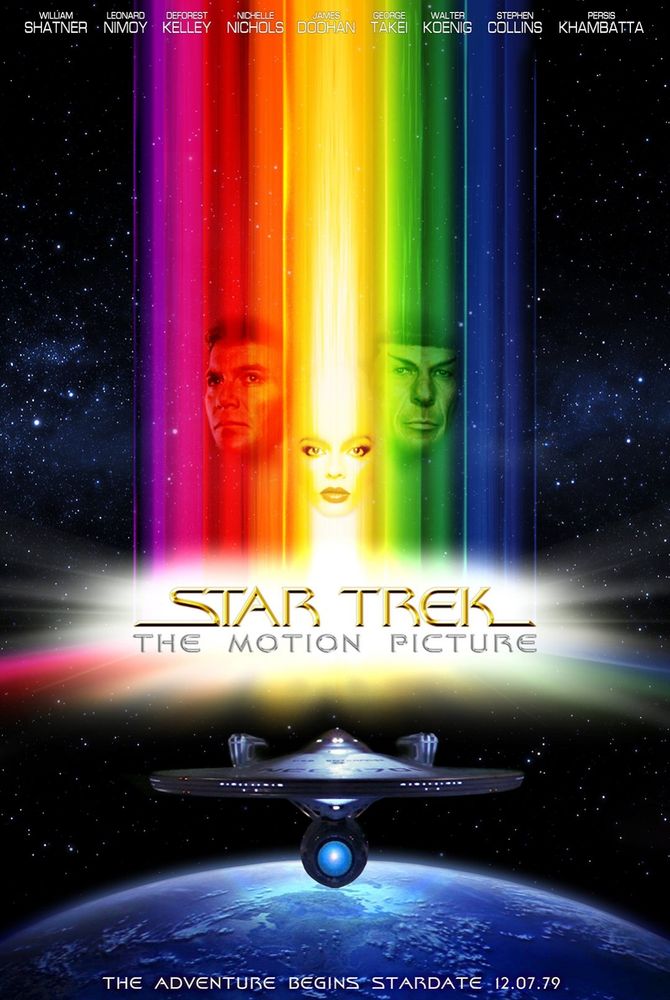 Poster for STAR TREK THE MOTION PICTURE with the faces of Kirk, Spock, and Illia viewed through rainbow bands of light converging on a starburst around the movie title, right above the USS ENTERPRISE