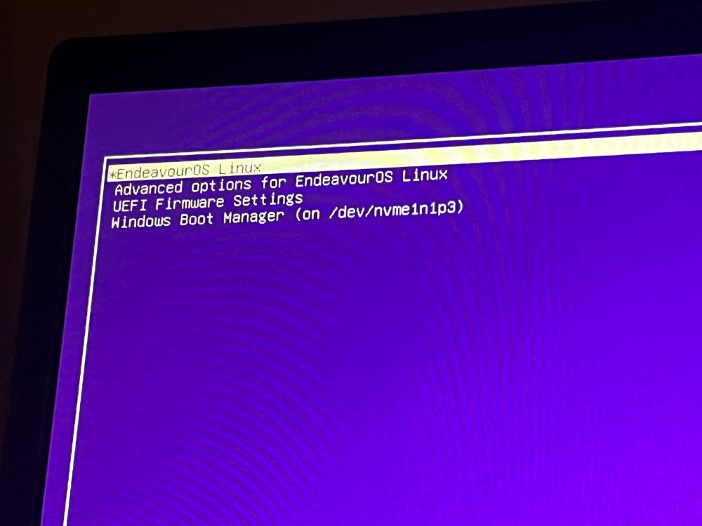 a GRUB boot selection screen with EndeavourOS Linux highlighted in white