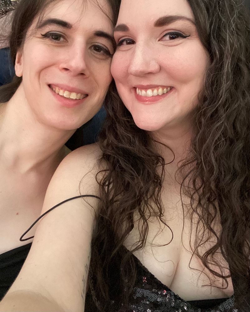 Selfie of Sophie Ladder and Luna Sapphire wearing black dresses and smiling 
