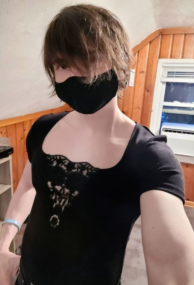 Me in an open-neck piece with some lacey details