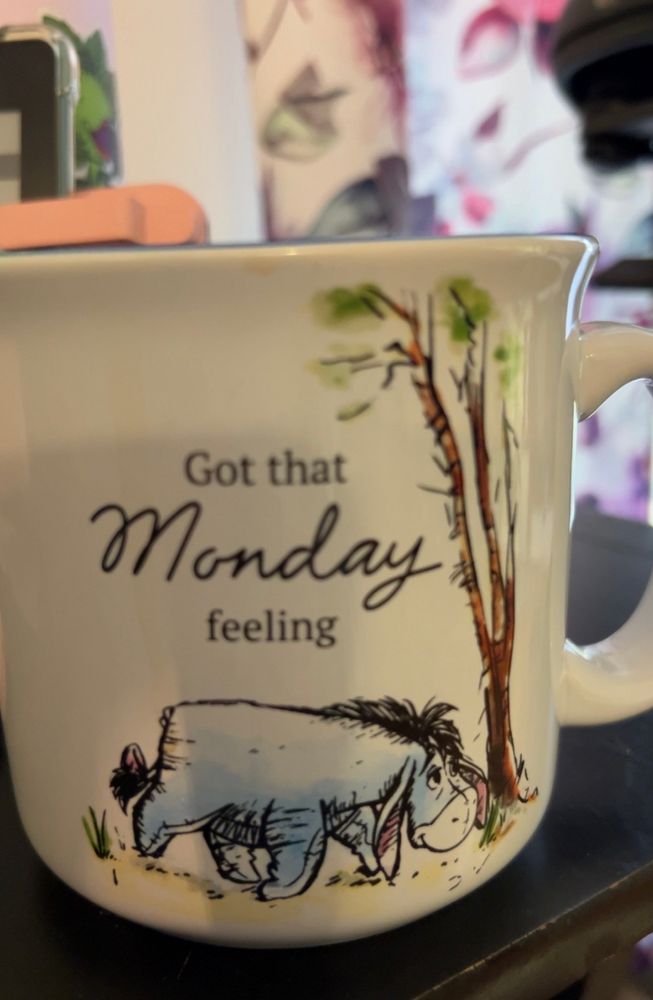 Eeyore coffee mug with the words, “Got that Monday feeling.”