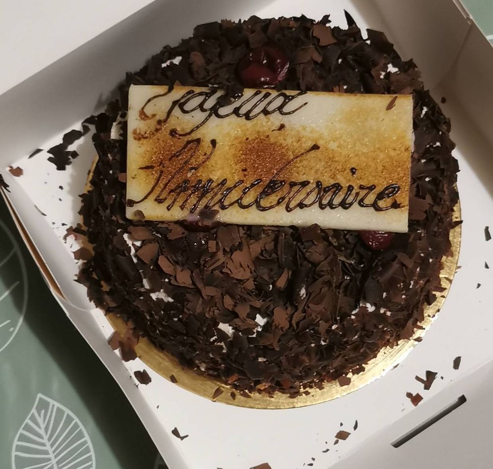A cake saying "Joyeux anniversaire" - For I'm the birthday girl today yaaay

It's a dark forest cake - cherry & chocolate