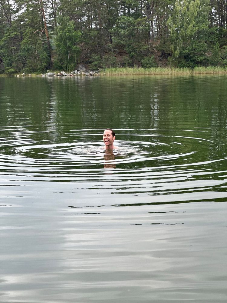 Me swimming with my head out of the water, doing a stupid grin