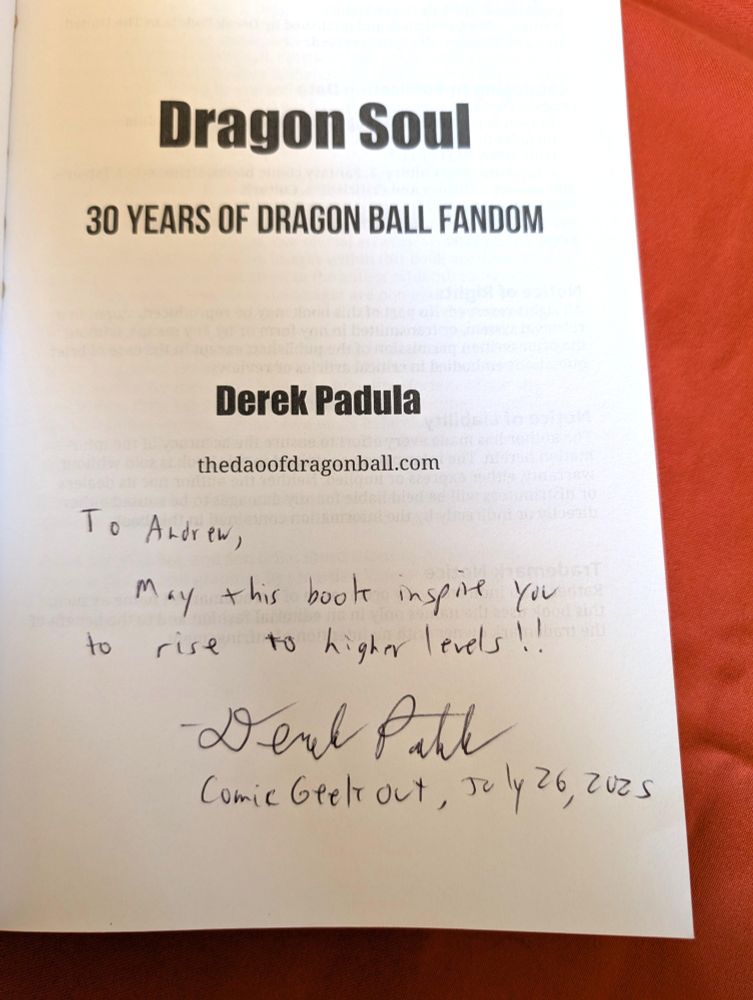dragon ball scholar derek padula sells nonfiction dragon ball books to his readers at the comic geek out event