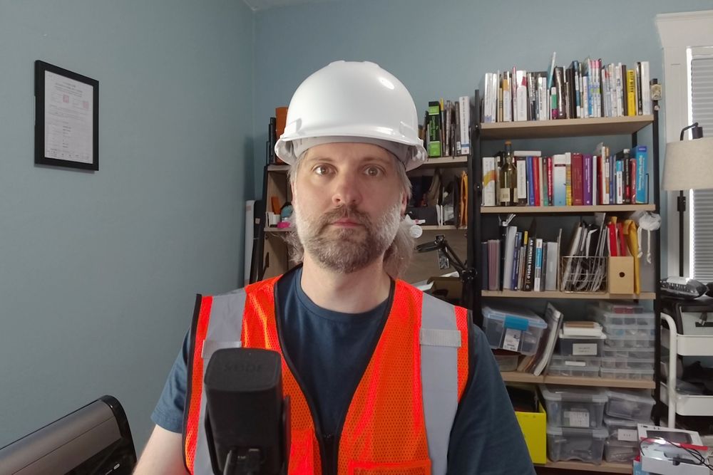 me wearing a hardhat and safety vest
