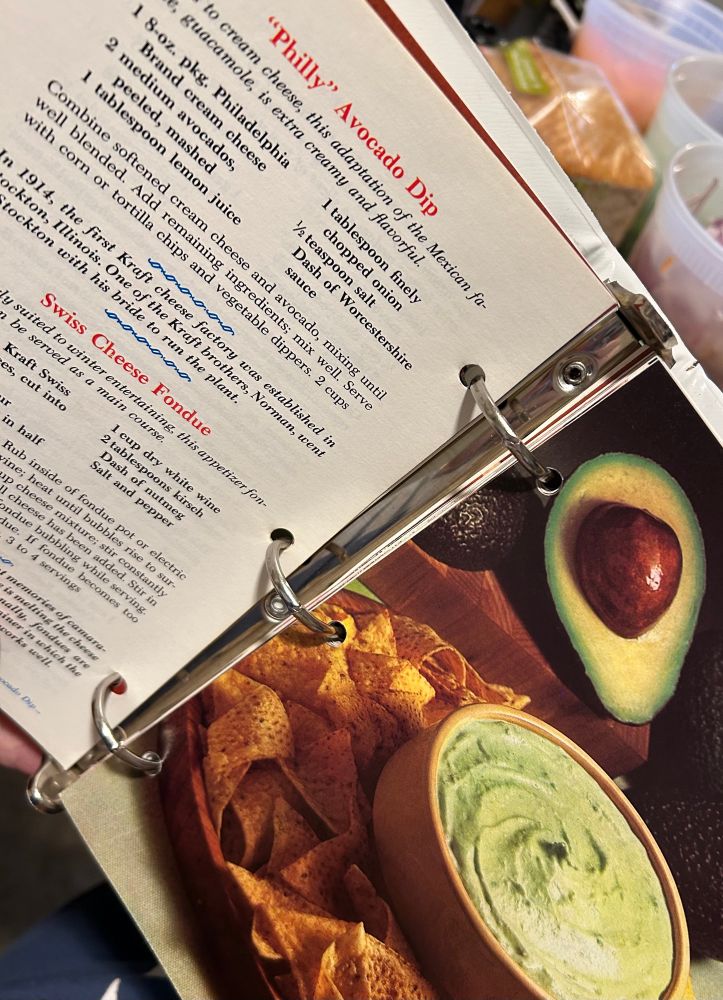 Shot of a recipe in a book next to the photographed dish 
