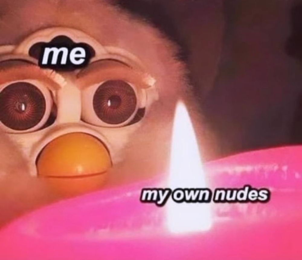 Furby toy with the labeled "me" starting at a candle flame labeled "my own nudes"