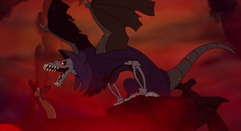 A scene from "All Dog's Go to Heaven" where the main character, ironically, is in hell. He's a dog being barked at by a skeletal demon dog sort of thing