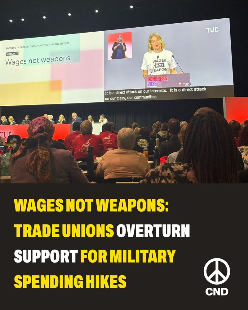Graphic with CND symbol and an image from TUC Congress showing UCU's Jo Grady visible on a large screen. She is wearing a t-shirt with the slogan "wages not weapons." Text below the image reads: "Wages not weapons: trade unions overturn support for military spending hikes."