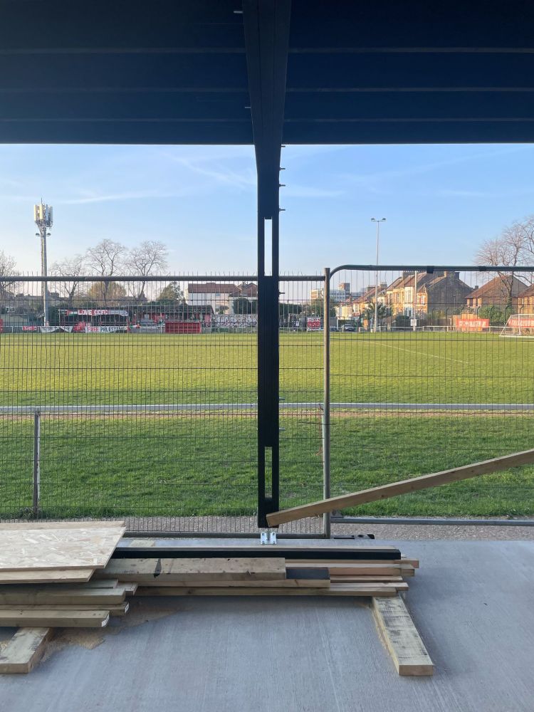 From inside the toilet block, under the roof
