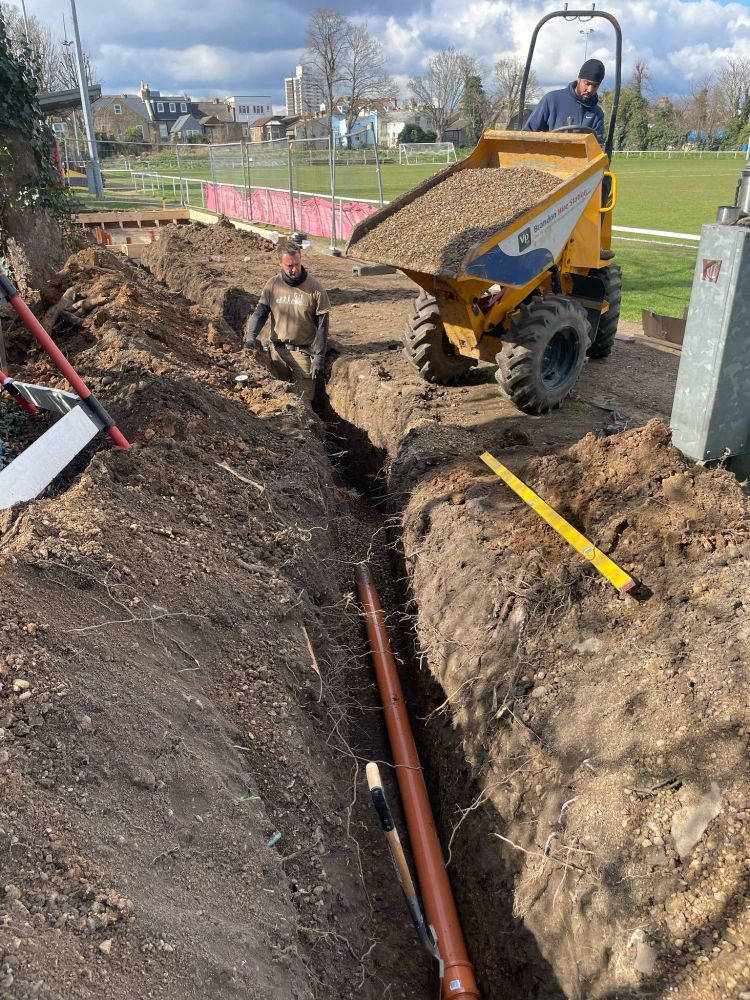 A ditch with pipes running through