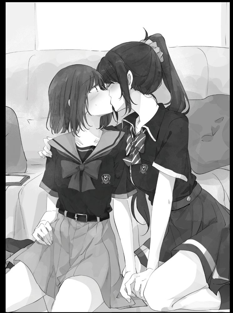 Rink kissing Yotsuba with with her eyes closed and one hand on Yotsuba's shoulder and holding her other hand. Yotsuba is surprised by this while both are in Rinka's bedroom. They're also wearing their school uniforms even though it's a Saturday.