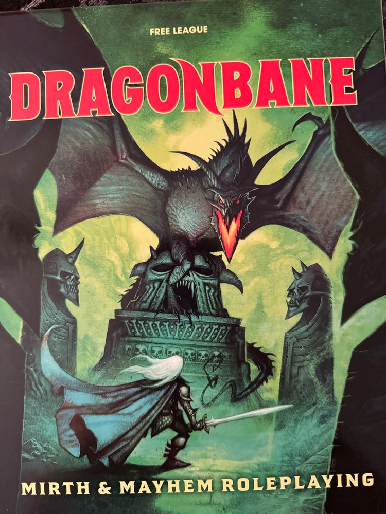 Dragonbane boxed set
Knight with 2h sword confronts a dragon that is perched on a tower 