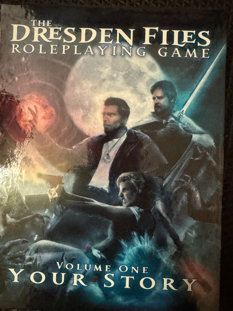Dresden Files ttrpg player book, featuring Harry Dresden and some pals