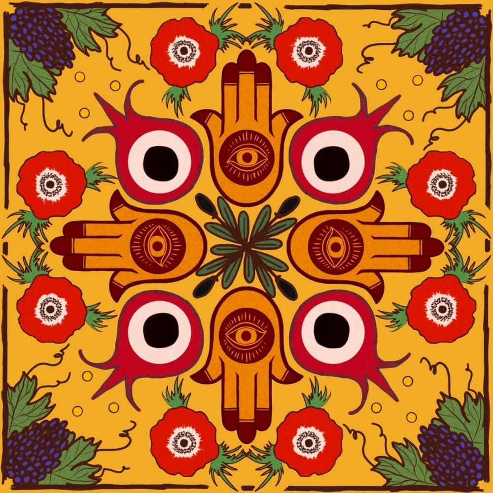 A yellow tile with purple grapes in each corner. In the middle there is a symmetrical pattern made from olive branches, four hands with henna painted on them, four pommegranates with the evil eye symbol and six poppy anemones. Celebrating Some of the fruits and plants of Palestine.
