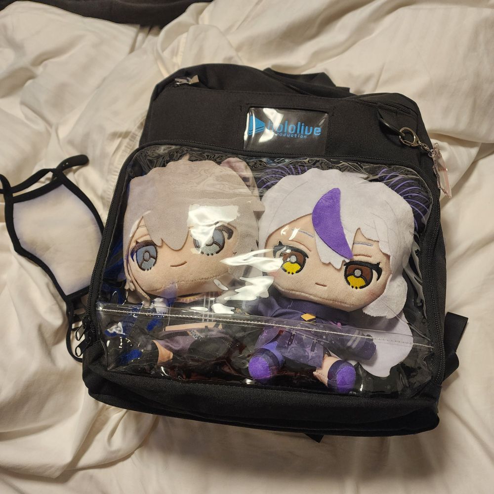 Botan and Laplus locked behind layers of reinforced macroplastic. A big sister and little sister, too powerful to be left at large.