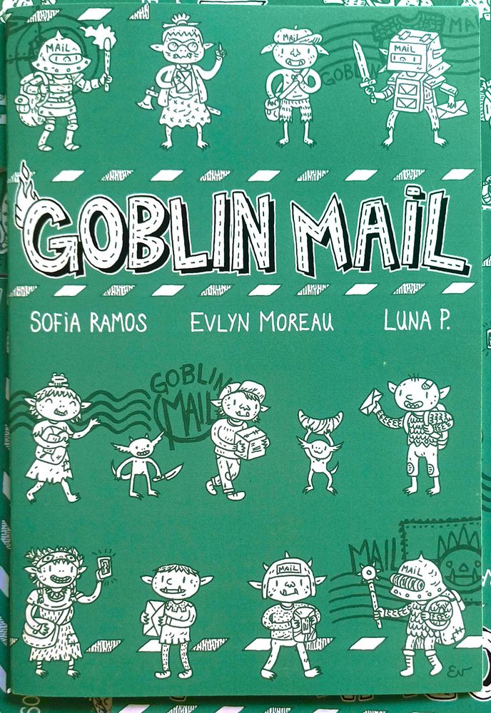 A photo of the goblin mail zine. It's cover shows multiple goblins with packages and letters, some wear armor and some have backpacks. The background is teal.