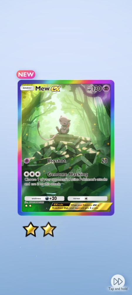 Image shows a full art Mew Ex with a rainbow striped boarder. Mew sits atop a pile of moss covered stone slabs in the middle of a lush forest, using it's foot to clean behind it's ears peacefully in a beam of sunlight