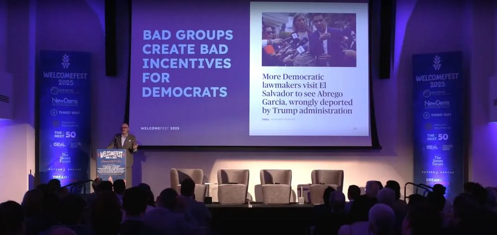 Matt Yglesias at WelcomeFest presenting a slide that says "Bad groups create bad incentives for democrats" with a screen shot of Democrats visiting El Salvador to see Kilmar Abrego Garcia