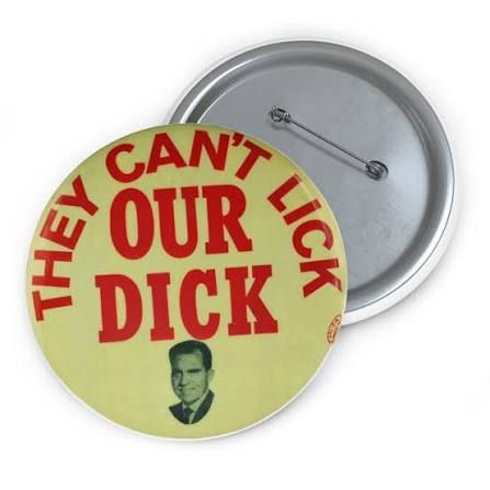 Richard Nixon's campaign pin reading "They can't lick our Dick"