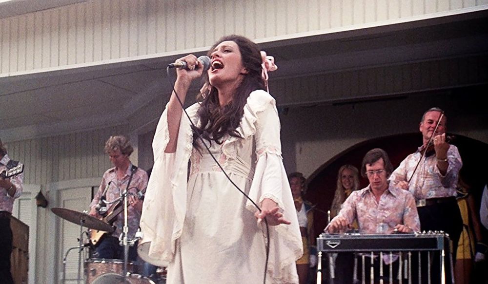 Barbara Jean (Ronee Blakley) and her band perform on the stage at Opryland USA in a scene from Nashville
