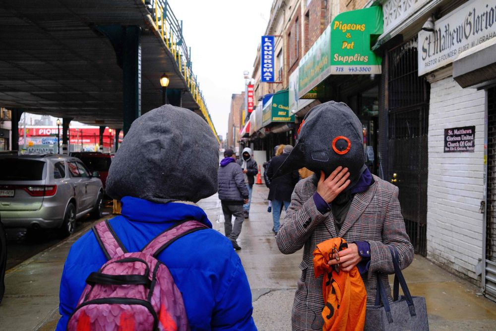 Pro Pigeon protesters in front of “Pigeons on Broadway”