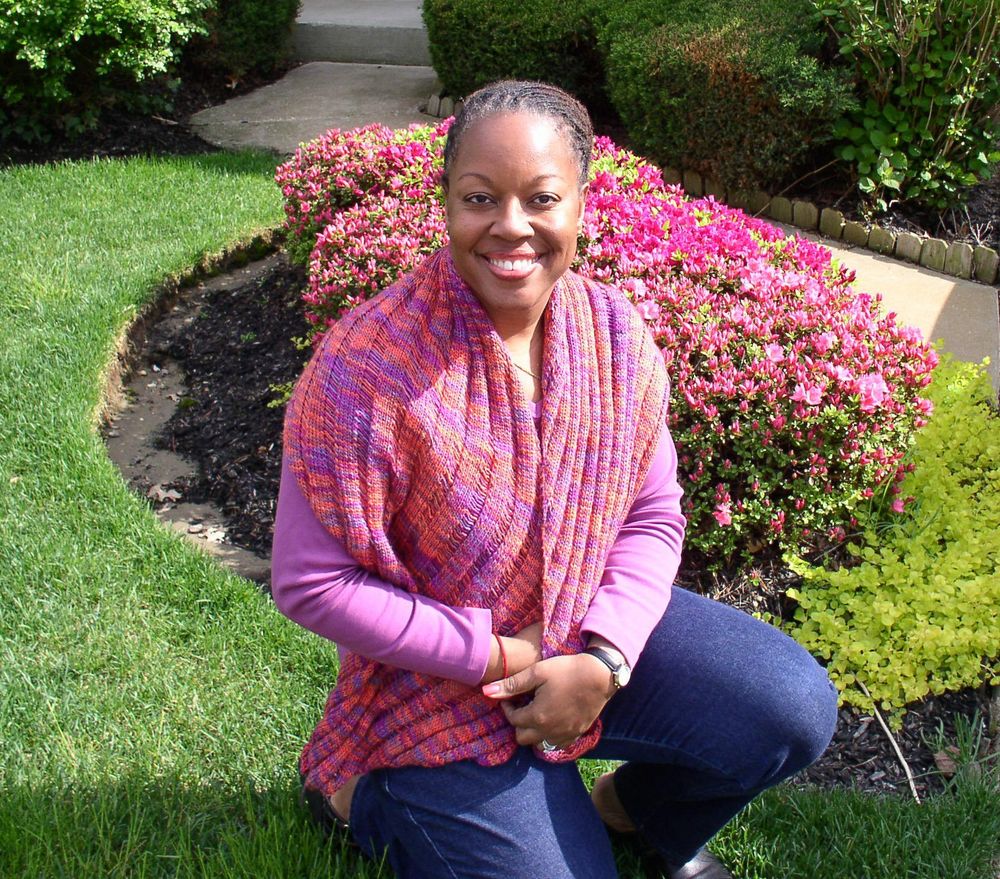 Woman wearing shawl. 