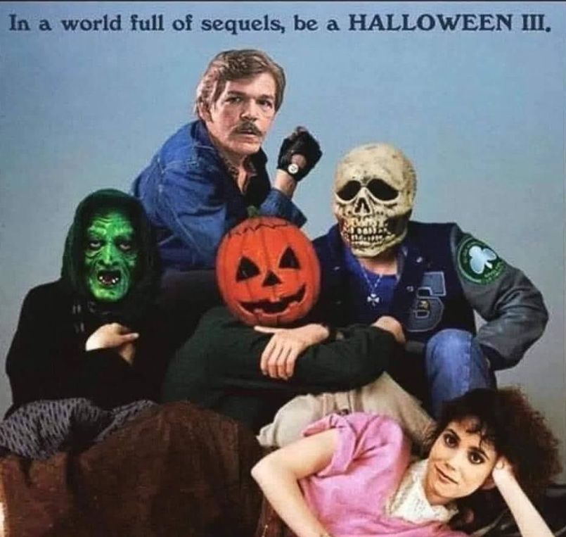 The iconic breakfast club poster with all the heads photoshopped to the three iconic masks from Halloween 3, Tom Atkins, and Stacey Nelkin.
