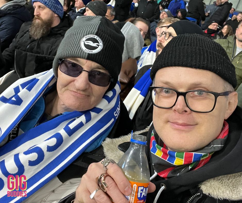 Gig Buddies wearing Seagulls football merchandise.
