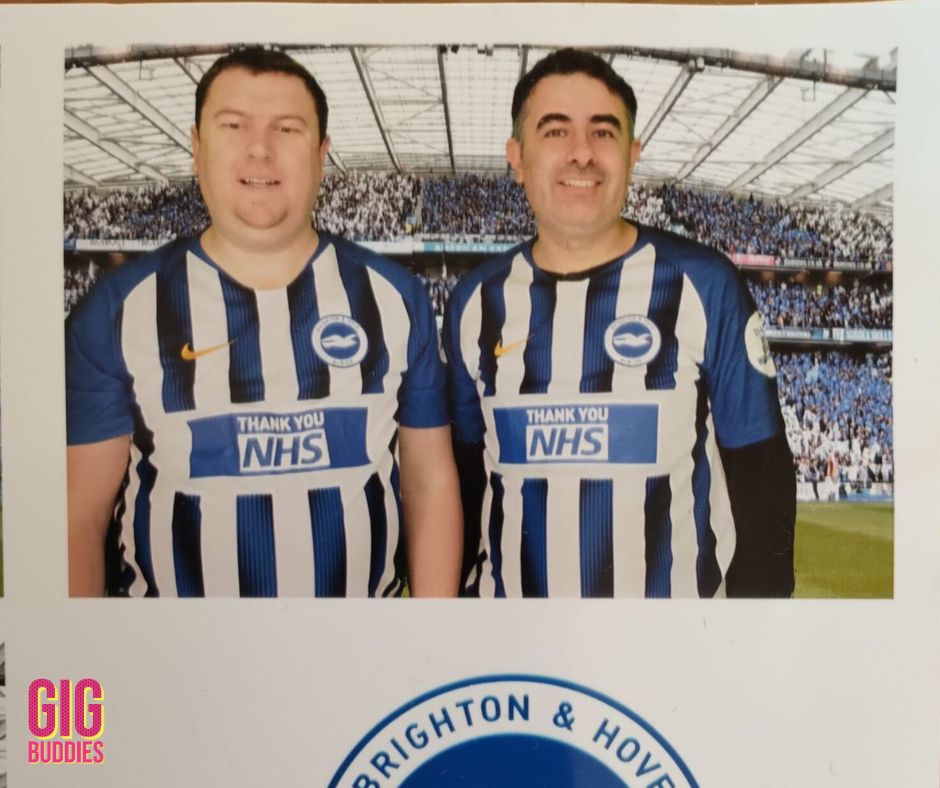 A polaroid of Gig Buddies in matching Brighton football shirts.