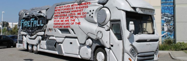 A photo of the firefall bus, on which somebody (it was meeee) has added a cringe tweet from Mark Kern, world's most embarrassing incel man-baby. The text (and the original tweet) reads "Do not fuck with gamers. We're forged by endless boss battles against impossible odds. We do not give up. We do not stop. We are the terminators of the culture wars."

The firefall bus, as it happens, did actually stop. 