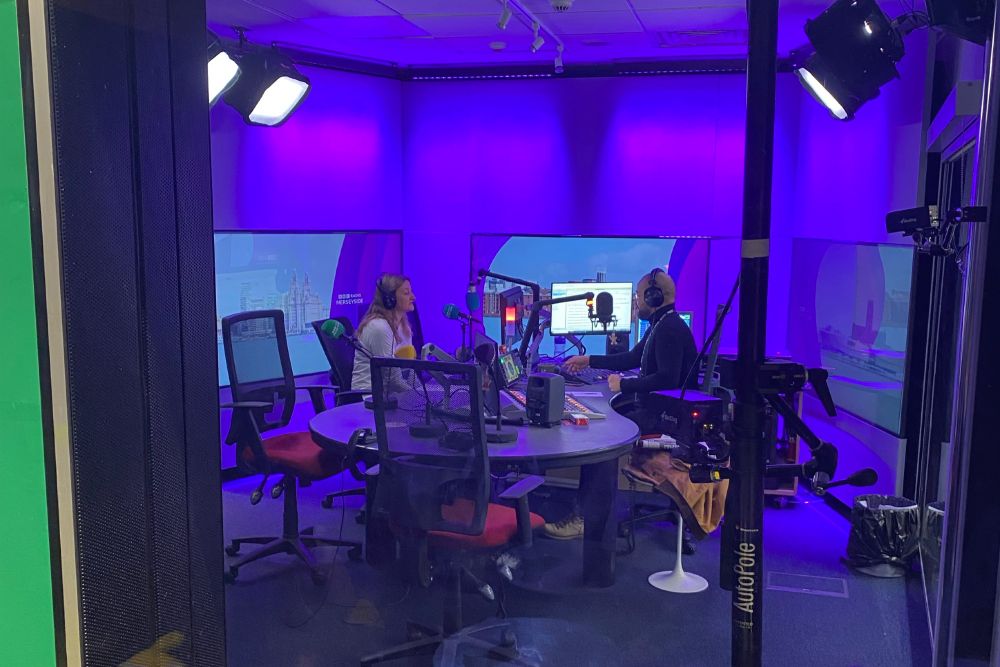 Hazel Norman, BES CEO sits in a radio studio with the presented, Kevin Duala.