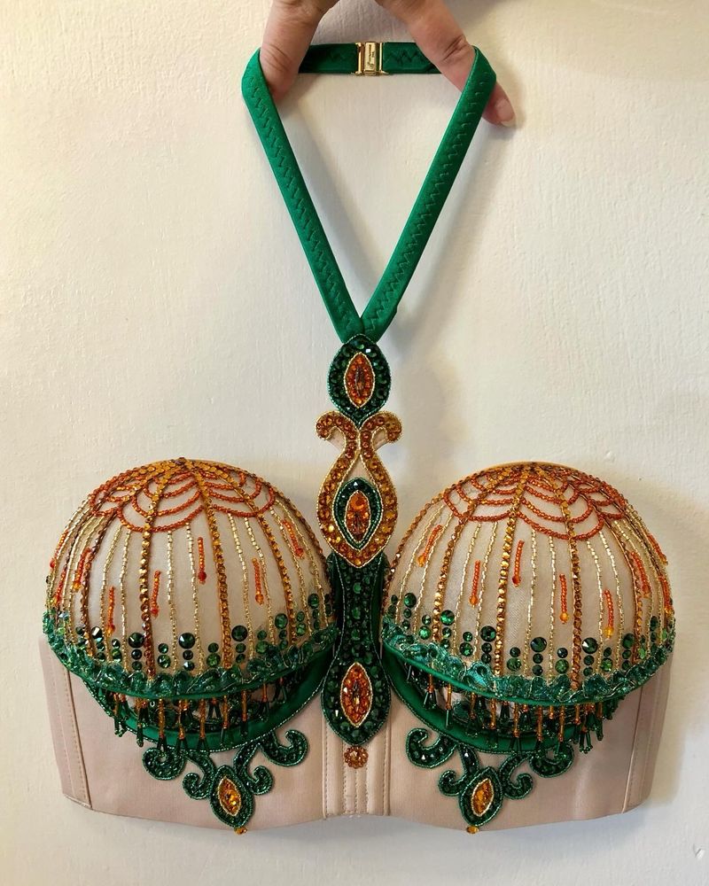 A bra modeled to look like twin birdcages.