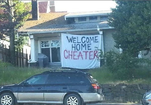 “WELCOME HOME CHEATER”