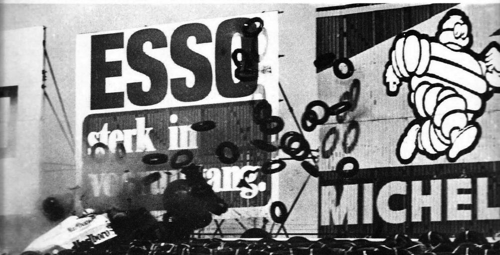 Michelin Man running away from tire wall debris after Andrea de Cesaris's accident in 1981