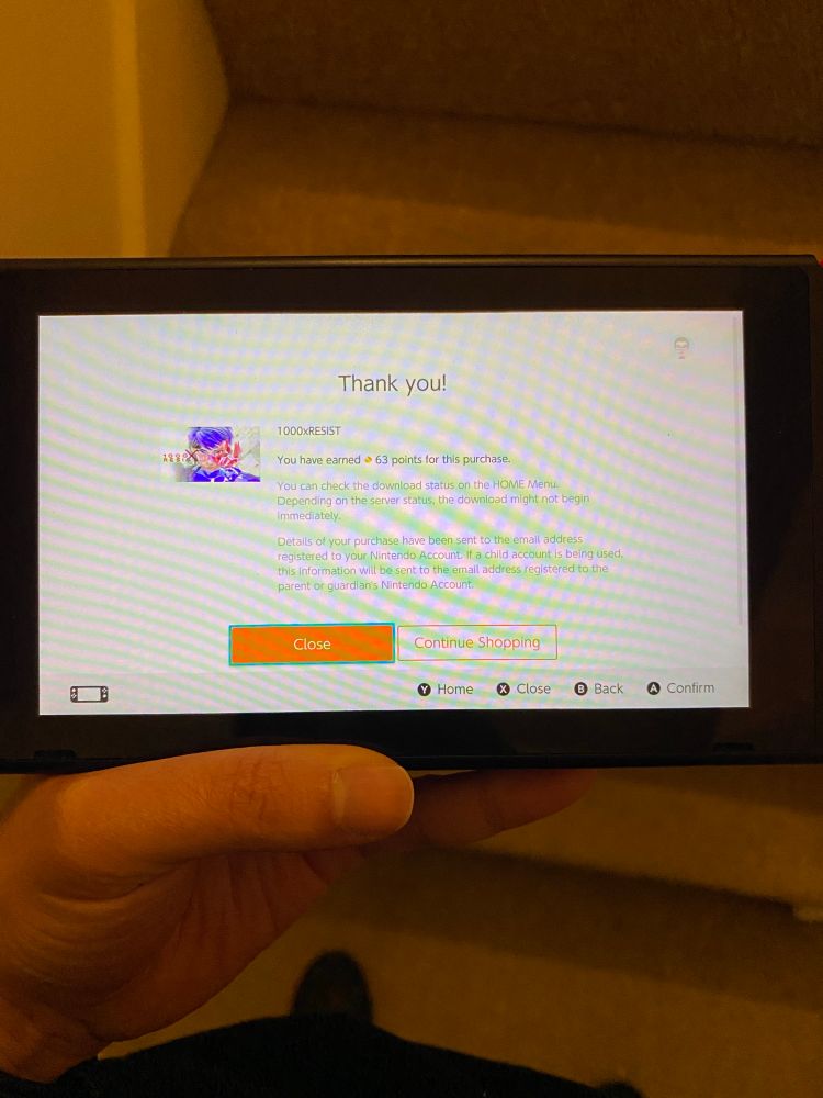 The screen of my Switch with the “thank you for purchasing” screen for 1000xRESIST