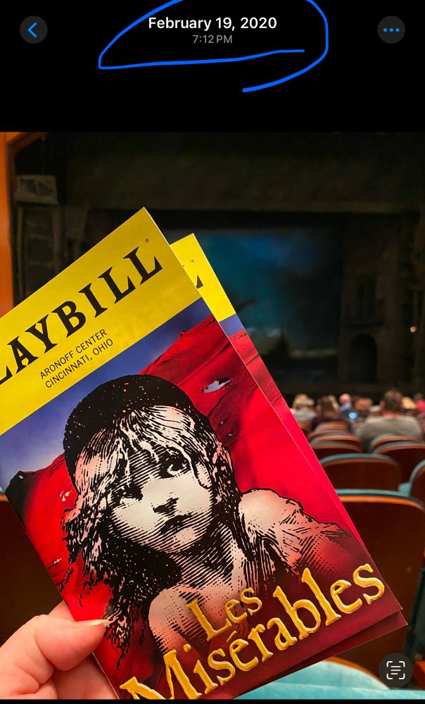 Playbill of Les Misérables in front of the stage from February of 2020