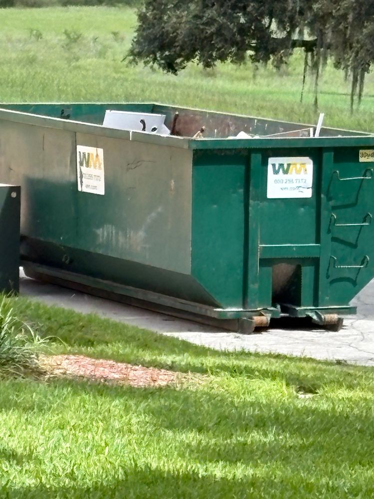 A green dumpster 